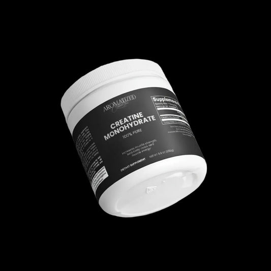Supplement container labeled 'Creatine Monohydrate' on a light gray background
